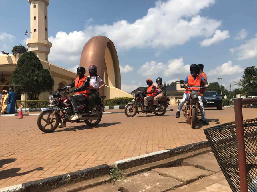 KAMPALA MOTOR BIKE TOURS (boda boda tours) - Owino Market: Kampala at full volume