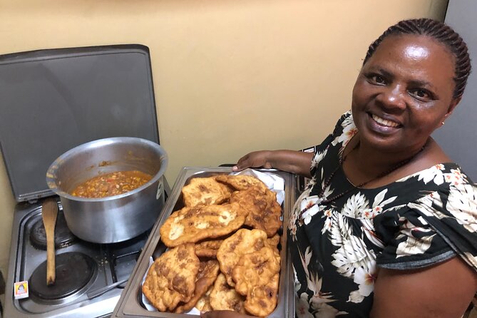 Private Ugandan Food Cooking Class and Culture Experience - Walking from fresh produce to the family kitchen